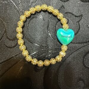 Tiffany & Co. Gold Bracelet with Turquoise Heart Charm